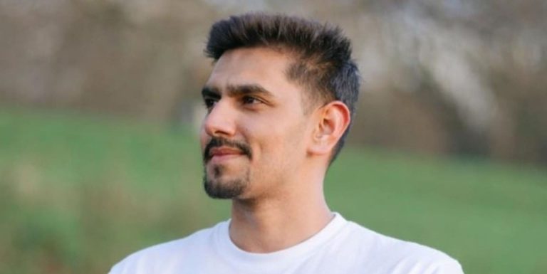 Profile portrait of Samir, the elite health coach and host of the wellness retreat